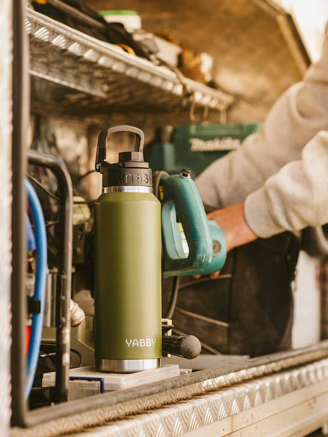 1.2L Yabby Green Insulated Stainless Steel Bottle with Swig Lid. Triple Wall. On site outdoors.