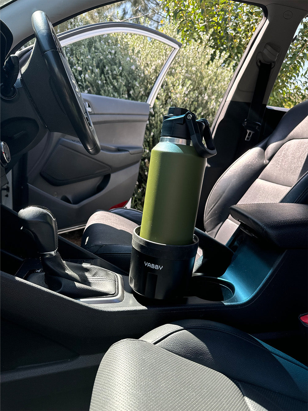 Car Cup Holder Australia. Suits New and Old Cars. Best Expander Cup Holder in Black at Yabby Outdoors. Inside Car with Insulated 1.2 Litre Water Bottle.